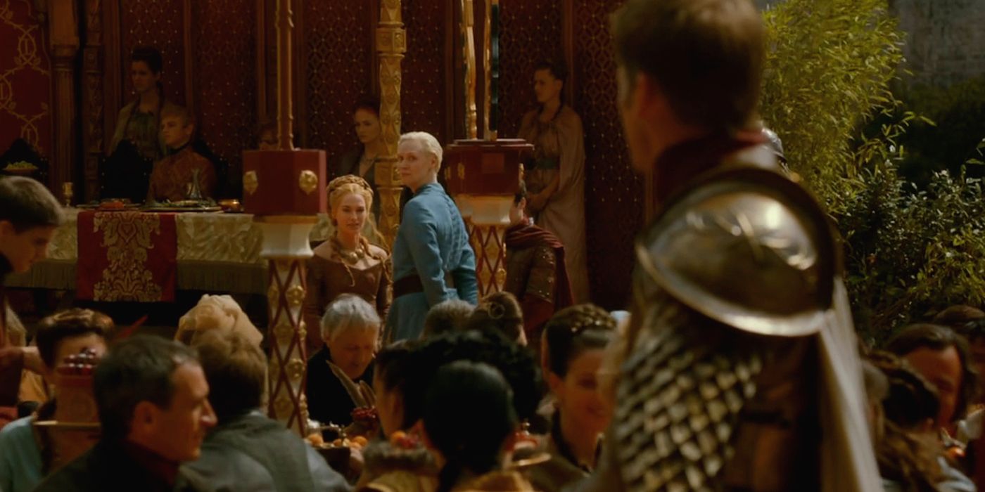 Game of Thrones Gwendoline Christie speaks with Lena Headey Cersei Lannister while Nikolaj Coster-Waldau Jaime Lannister looks on at the Blue Wedding