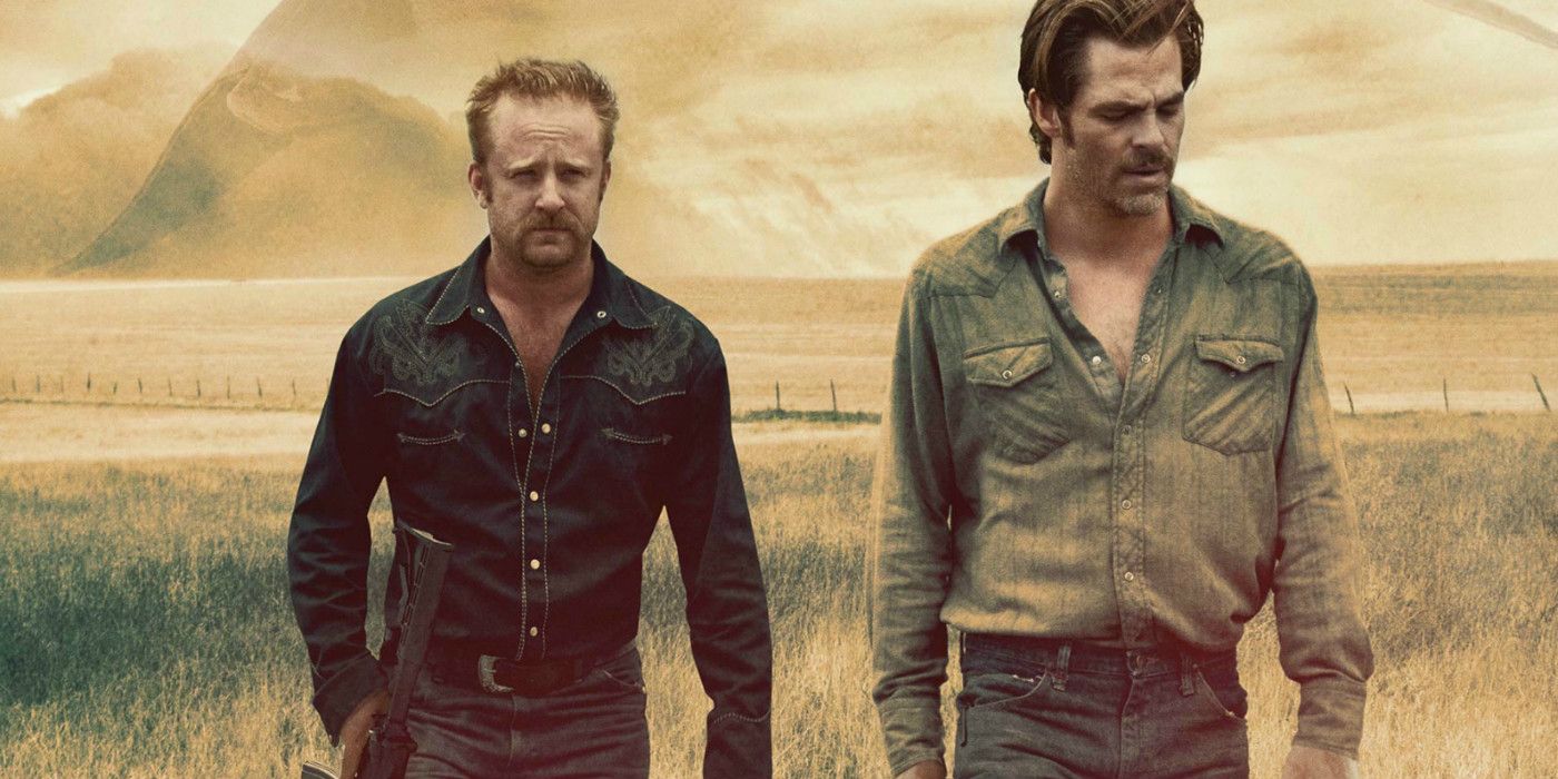 Chris Pine and Ben Foster walking in a field in Hell or High Water.