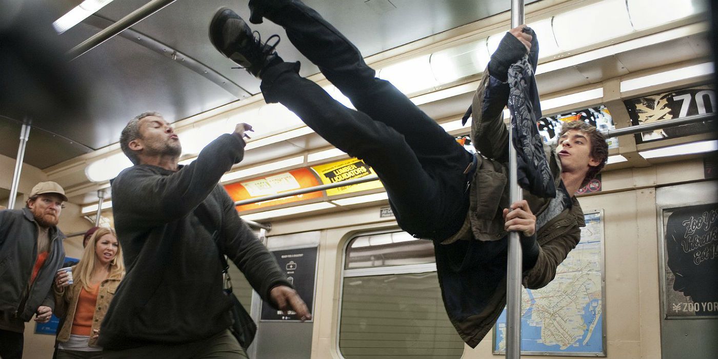 Peter Parker fights thugs on the subway in The Amazing Spider-Man 2