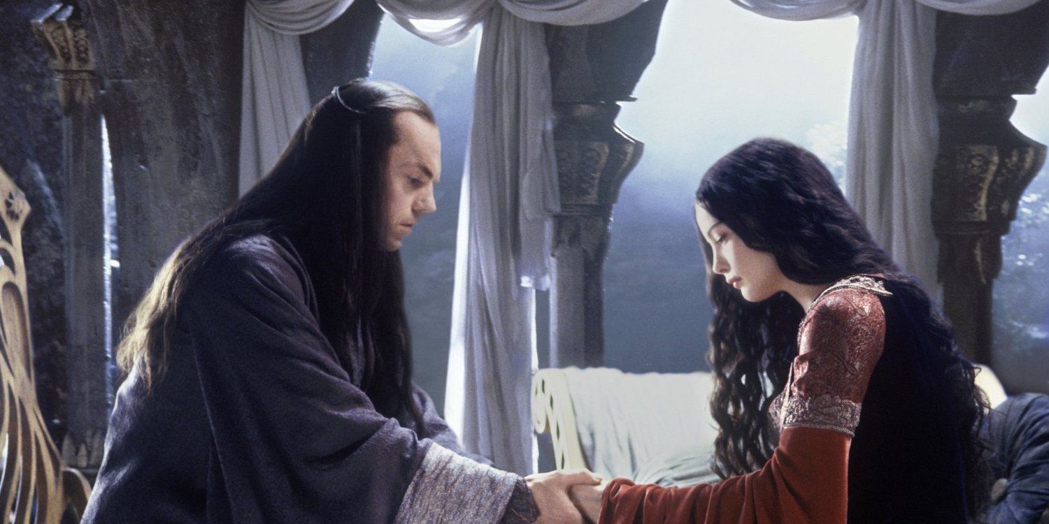 Arwen holding her father's hands in The Lord Of The Rings
