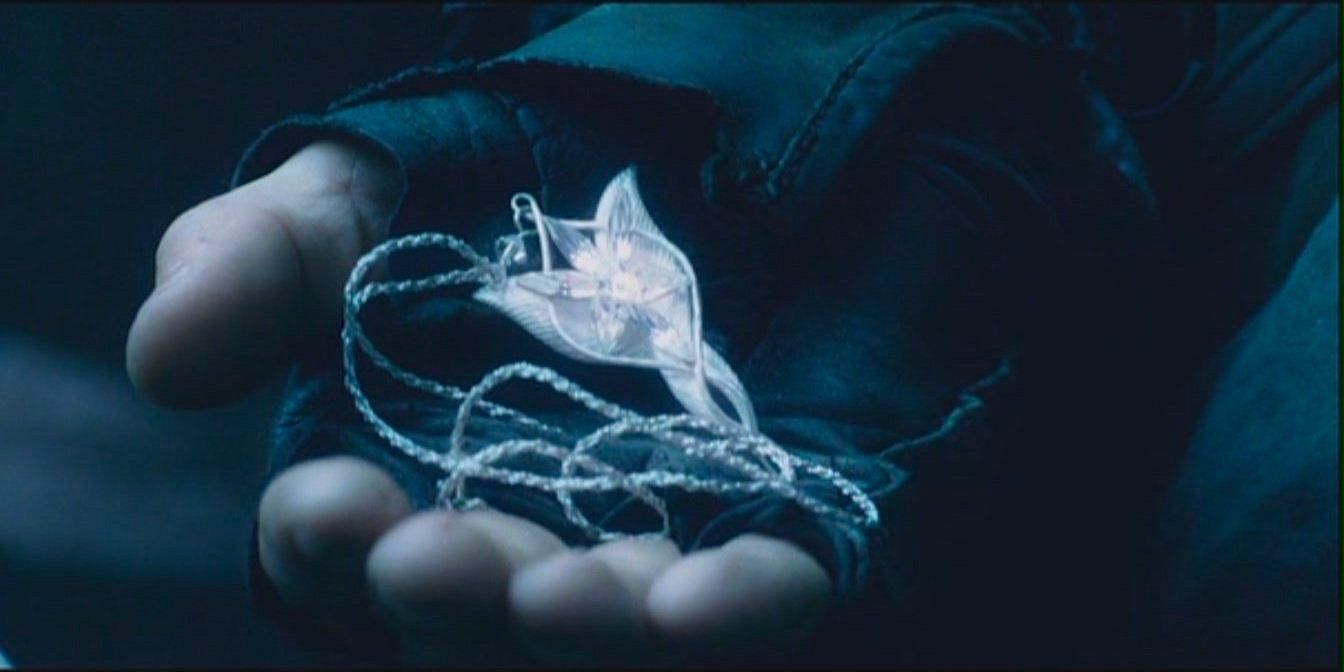 Aragorn holds the Evenstar pendant in The Lord of the Rings.
