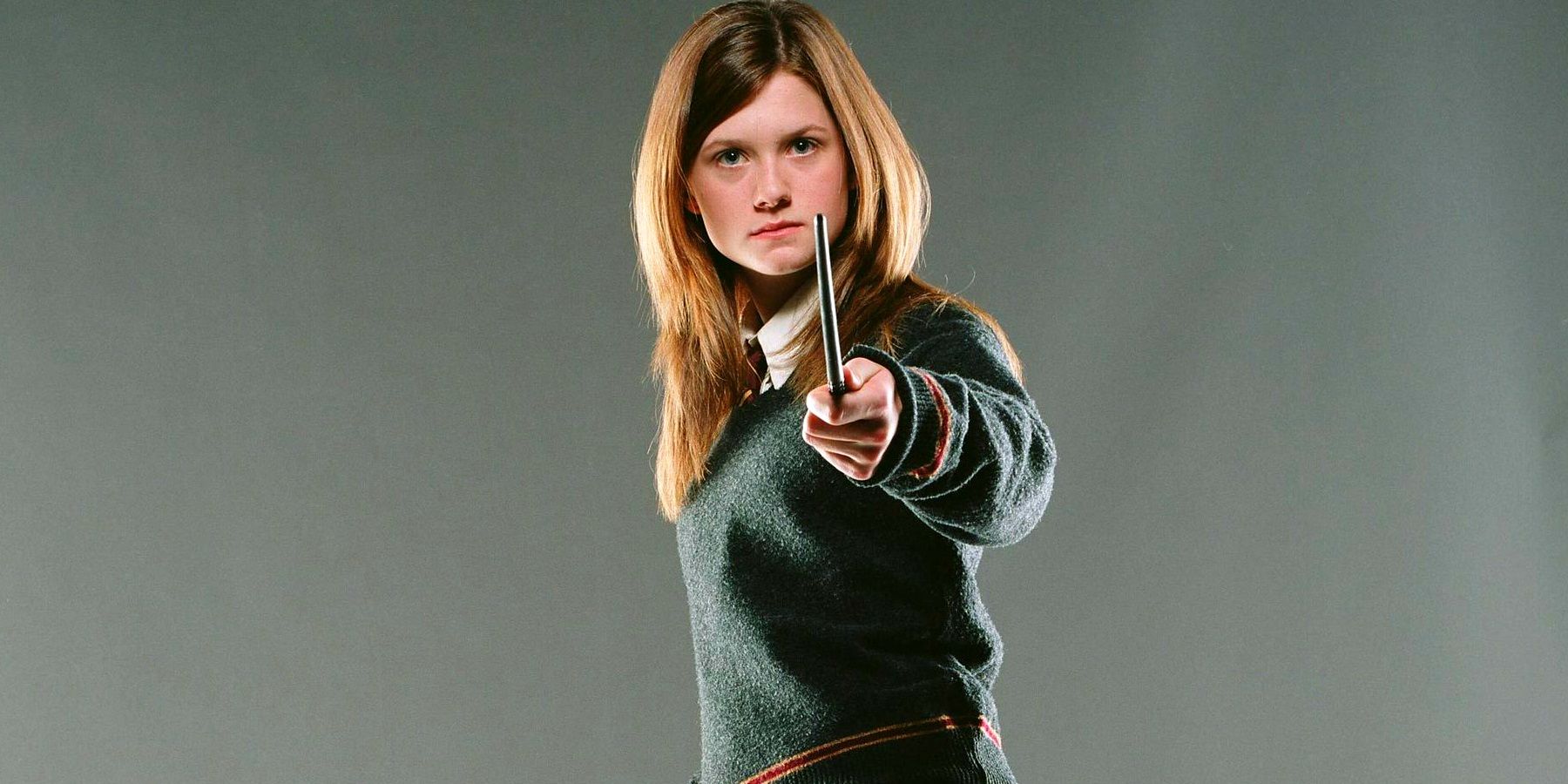 Ginny Weasley with her wand.