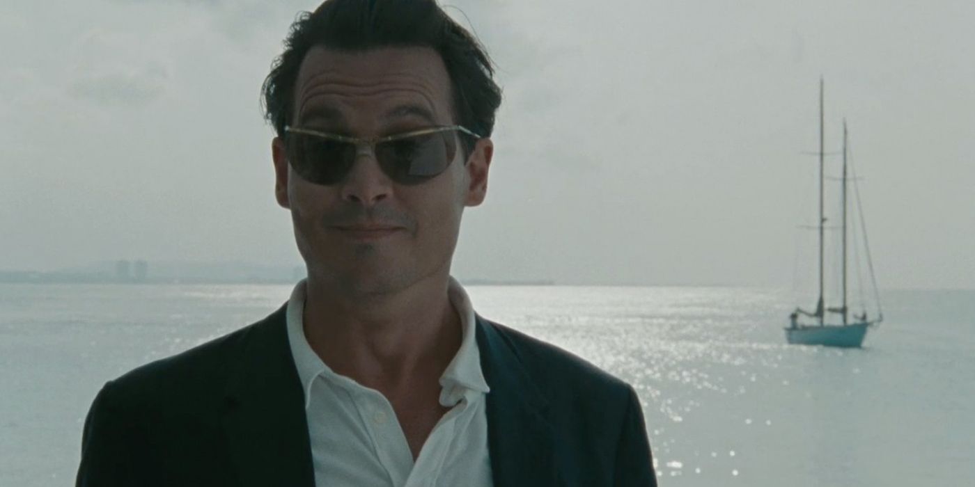 Johnny Depp grinning in The Rum Diary