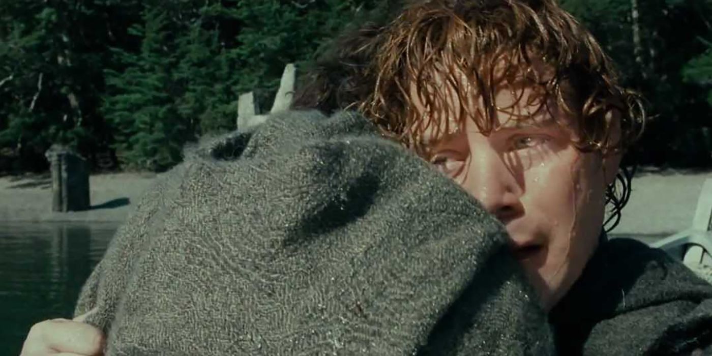 Sam hugs Frodo in the boat in The Lord of the Rings
