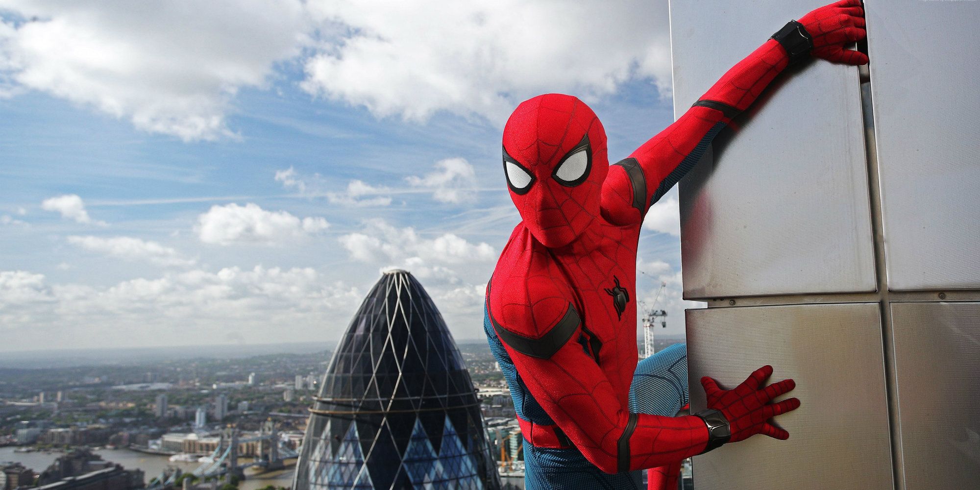 An image of Spider-Man climbing a building in Spider-Man: Homecoming
