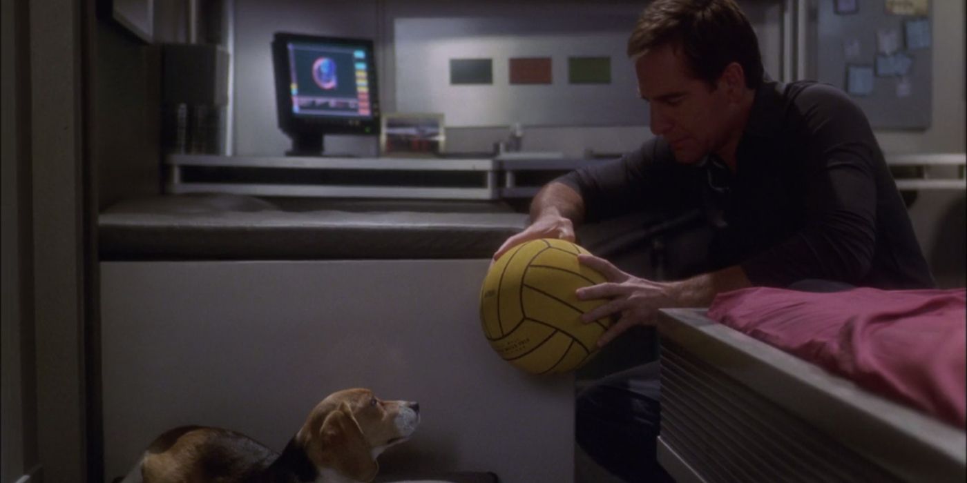 Captain Archer with the two things that lift his mood, water polo and his dog Porthos