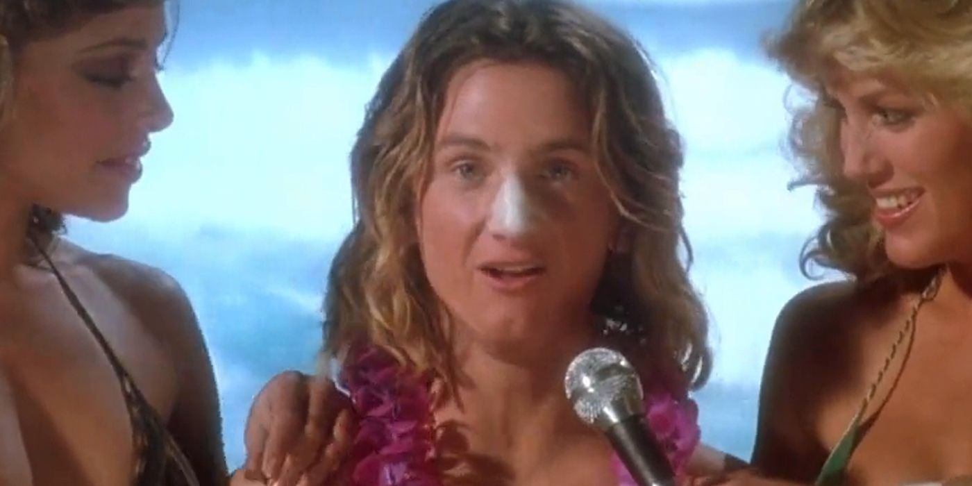 Spicoli talks into a microphone with sunscreen on his nose from Fast Times At Ridgemont High 