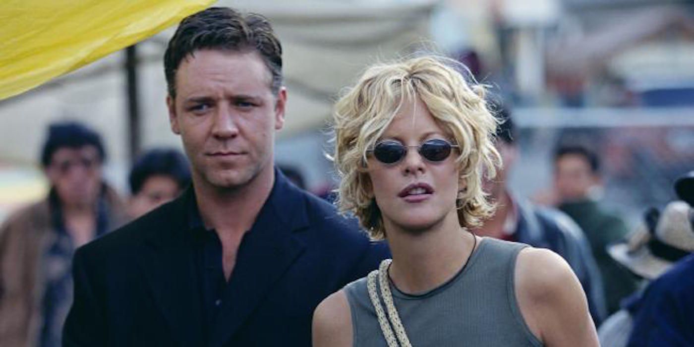 Russell Crowe and Meg Ryan walk through a market in Proof of Life