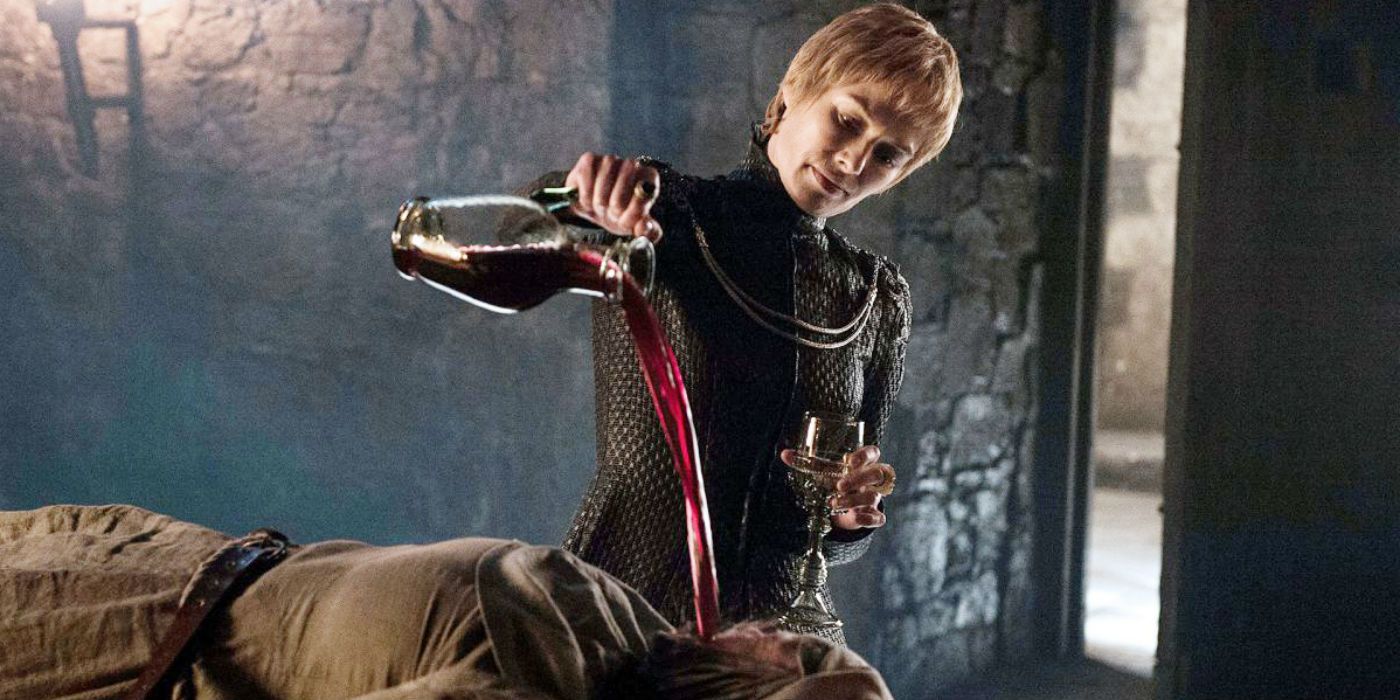 Cersei Lannister pours wine on Septa Unella's face in Game of Thrones.