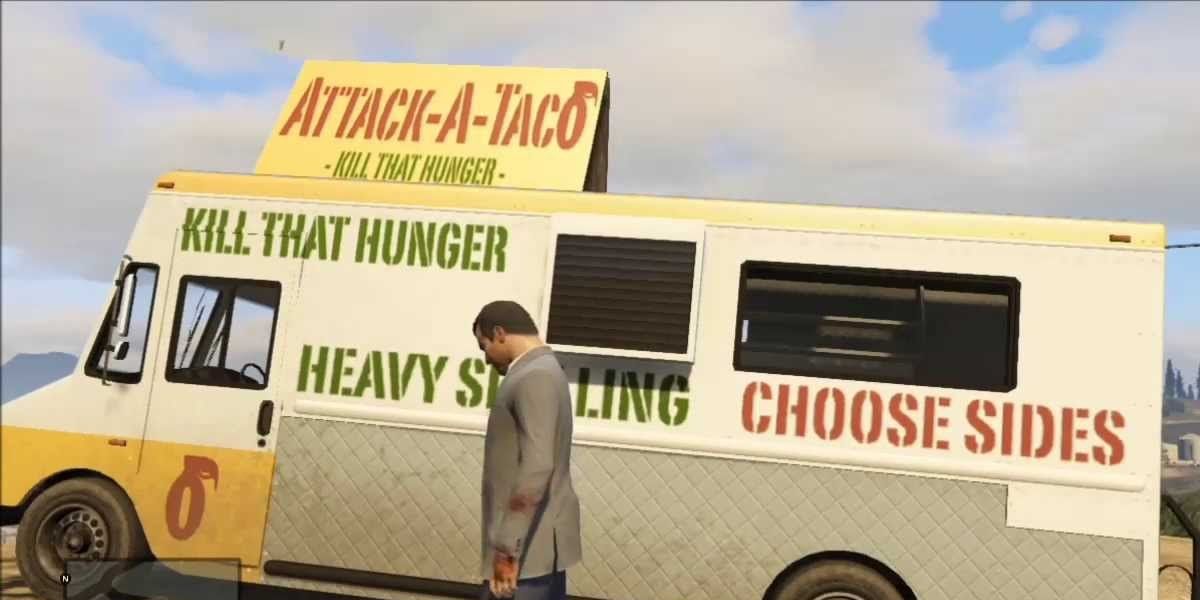 Player standing next to an "Attack-A-Taco" taco van in GTA 5.
