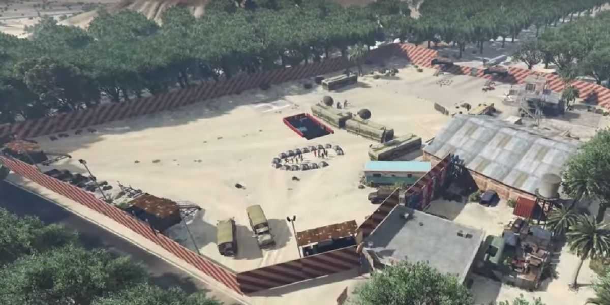 Overhead view of a large walled area serving as a survival cam for a zombie apocalypse.