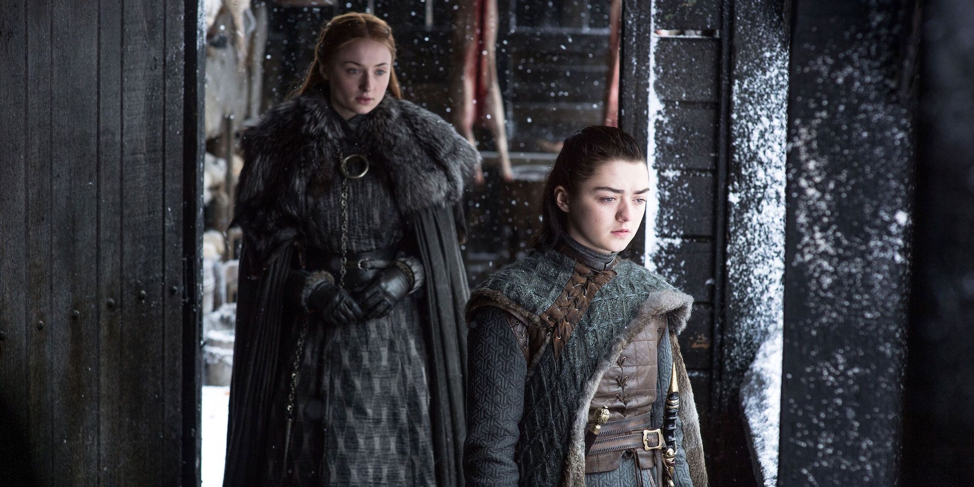 Sansa and Arya at Winterfell in Game of Thrones.