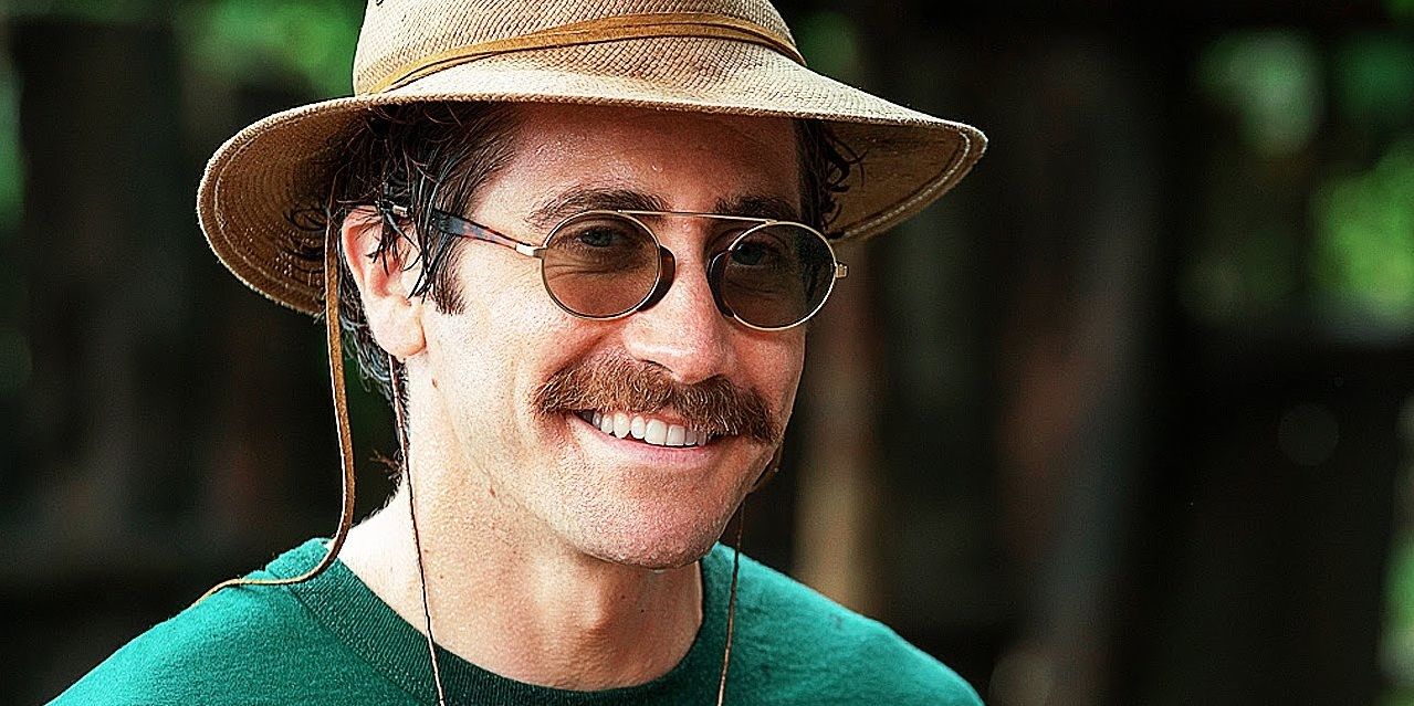 Dr. Johnny smiling widely in Okja