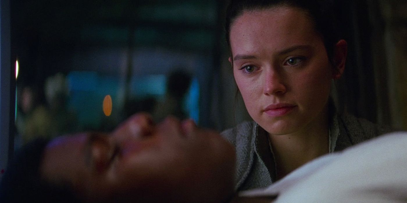 John Boyega as Finn and Daisy Ridley as Rey in Star Wars The Force Awakens