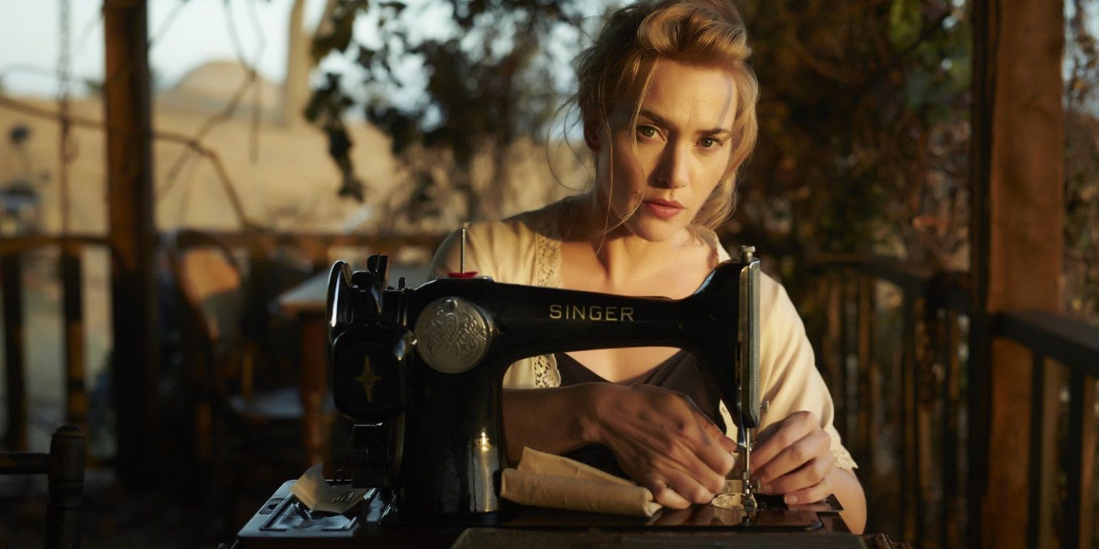 Kate Winslet sewing clothes in The Dressmaker