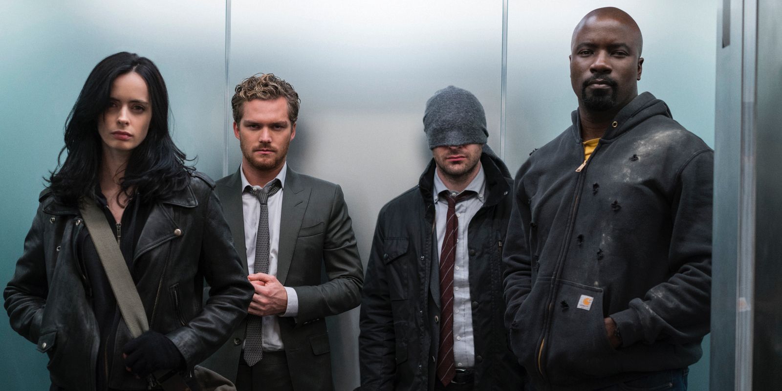 Krysten Ritter Finn Jones Charlie Cox and Mike Colter in Marvel's The Defenders