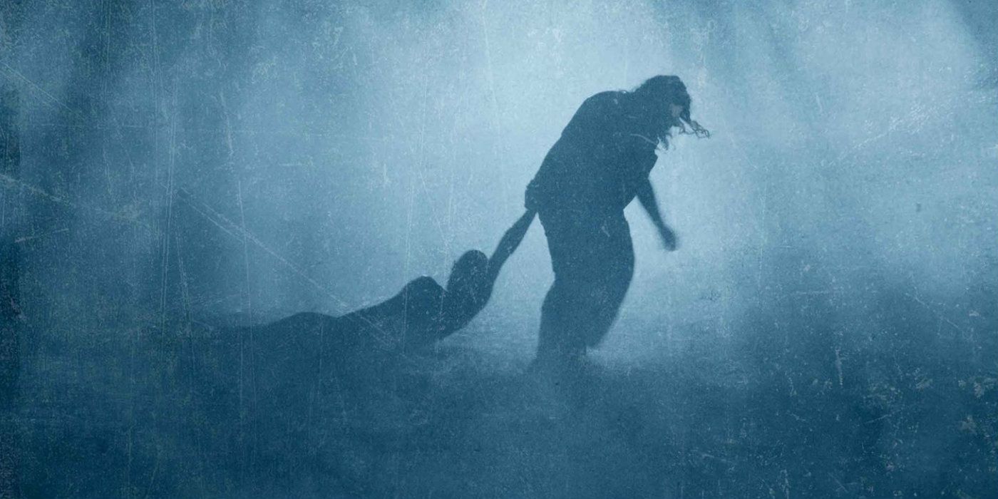 A silhouette of Leatherface dragging a body.