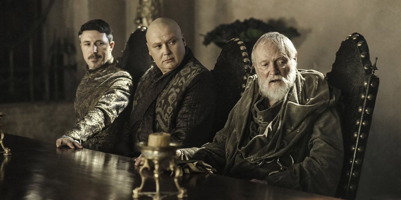 Littlefinger, Varys, & Maester Pycelle at a Small Council meeting in Game of Thrones