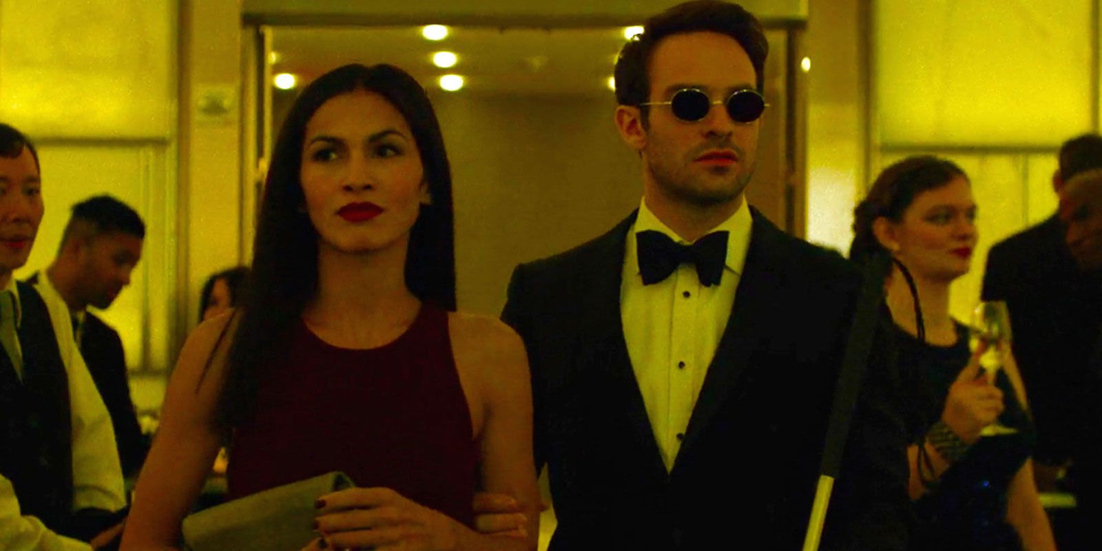 Matt and Elektra walk into an event in Daredevil's Regrets Only