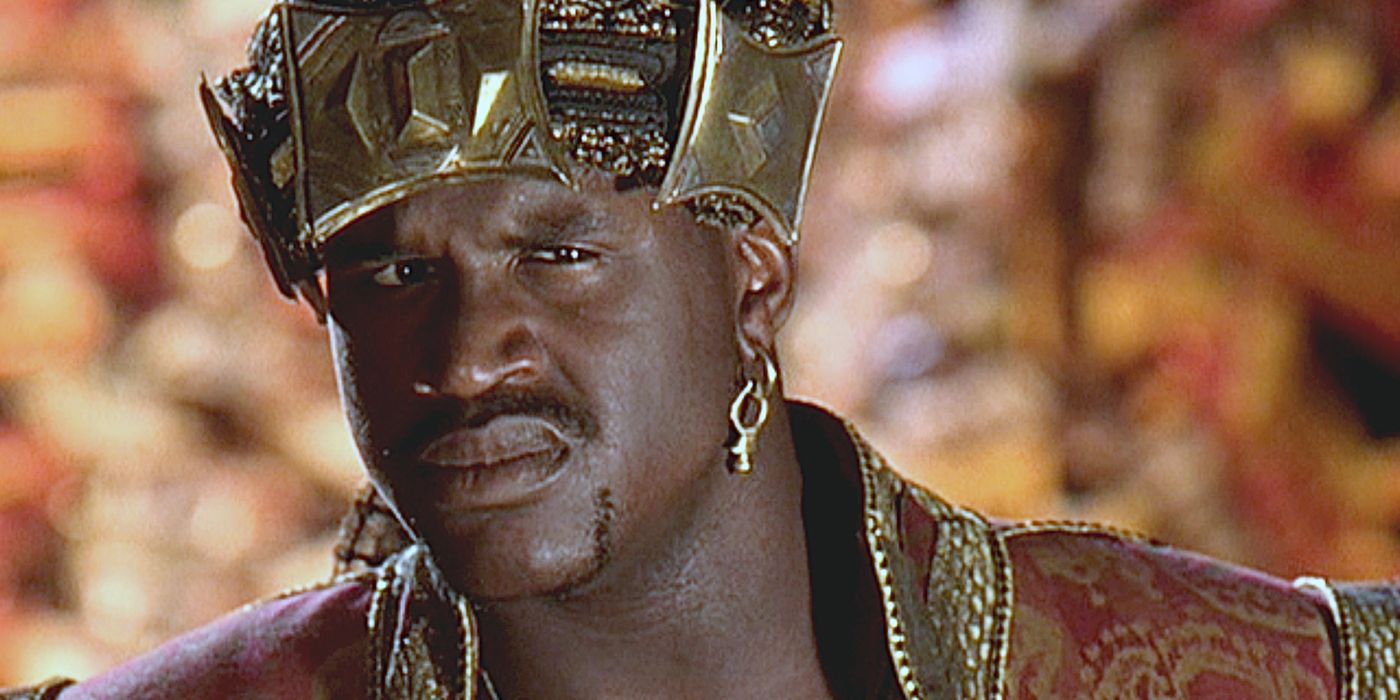 Kazaam in a golden crown looking confused