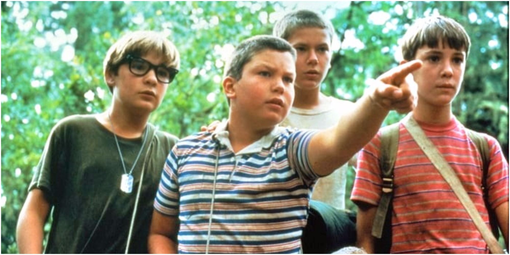 The kids in Stand By Me point and look on