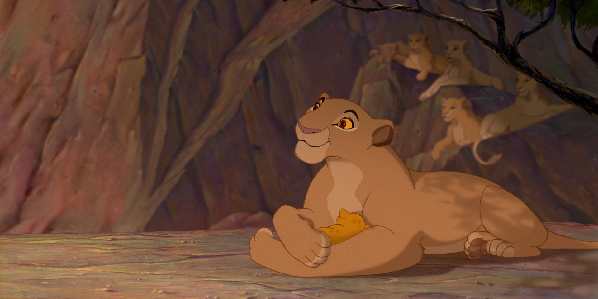 Sarabi holding a baby Simba in Lion King