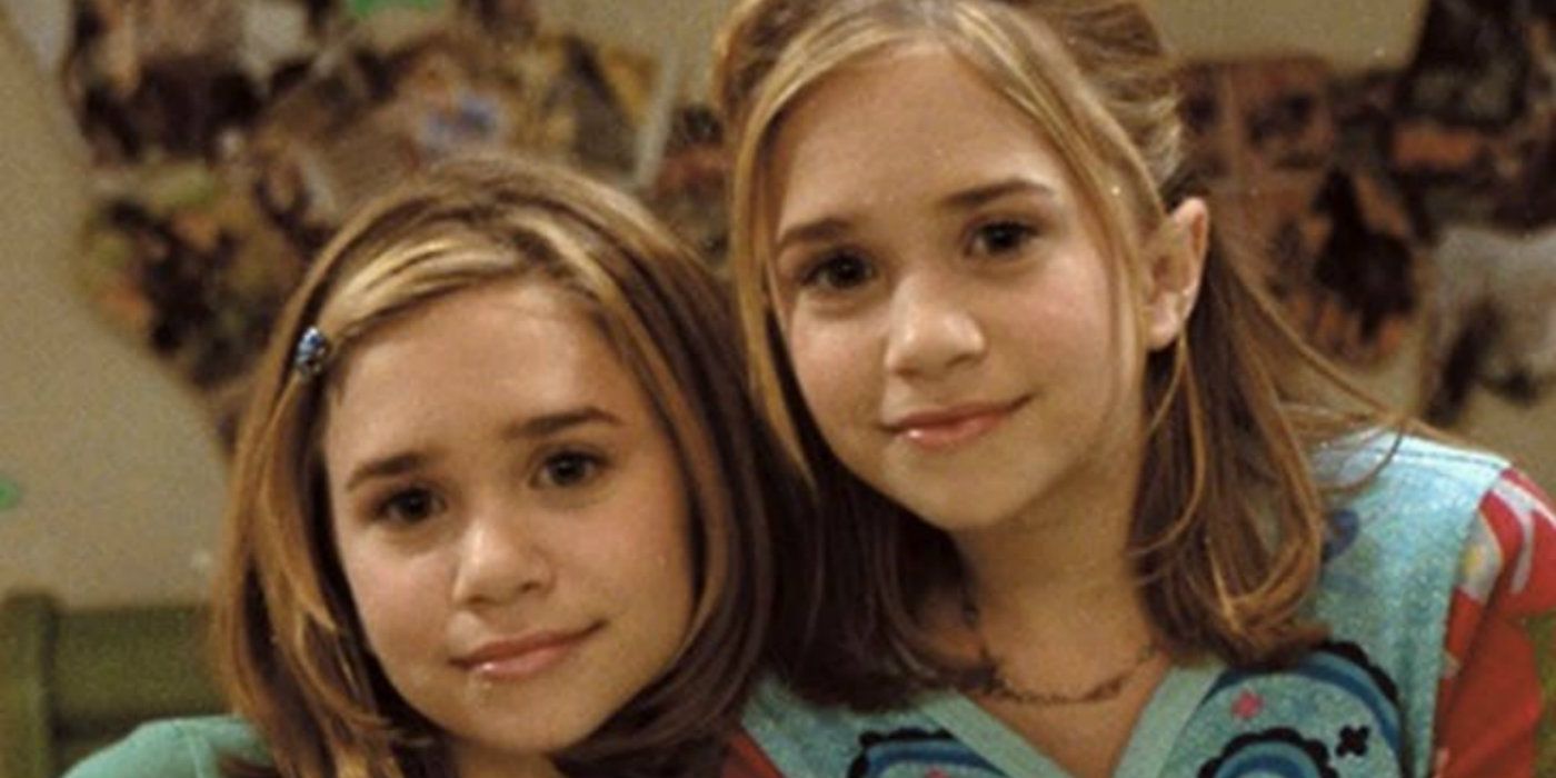 Mary-Kate and Ashley Olsen smiling in Two of a Kind
