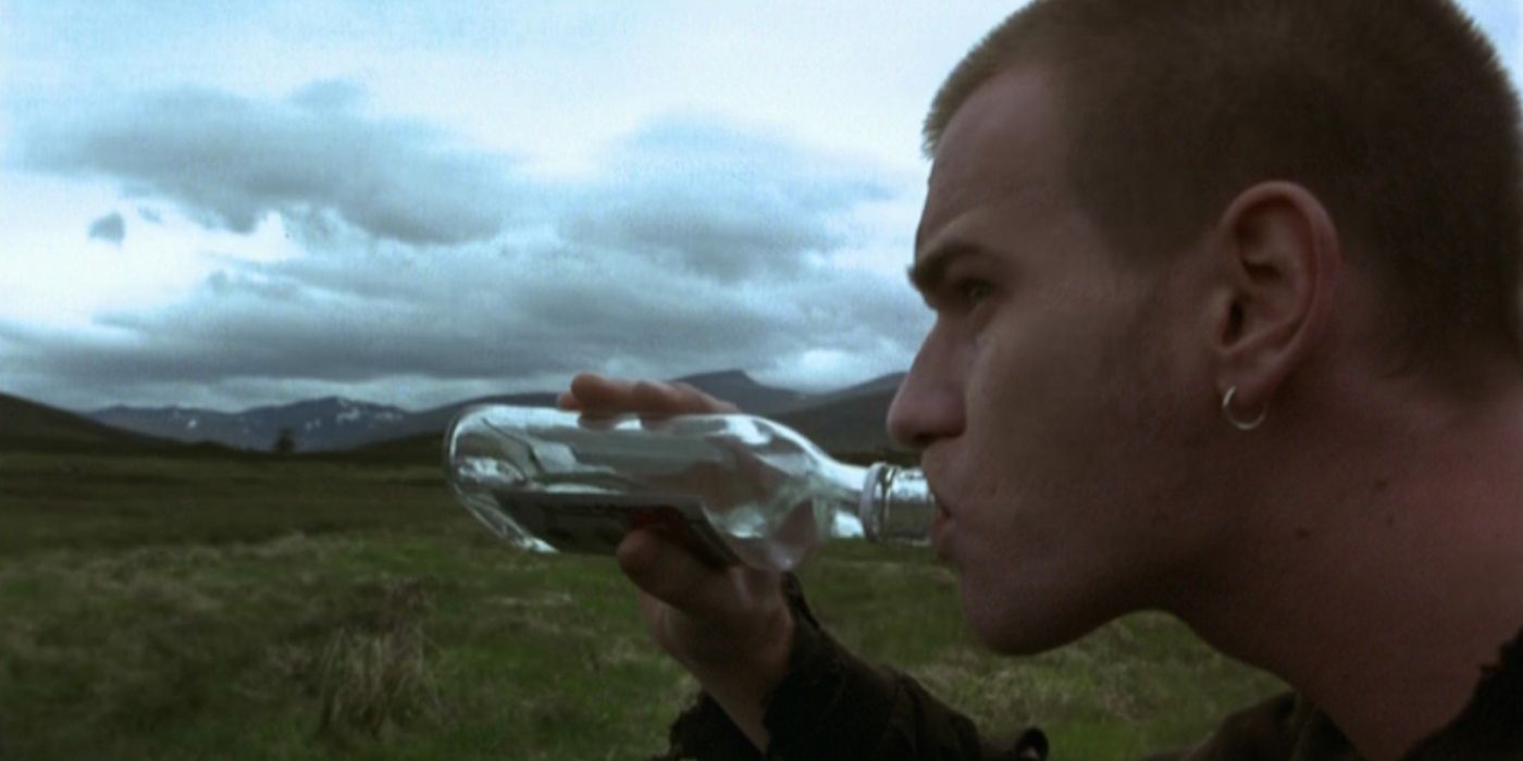 Mark Renton (Ewan McGregor) drinking out of a bottle in Trainspotting.