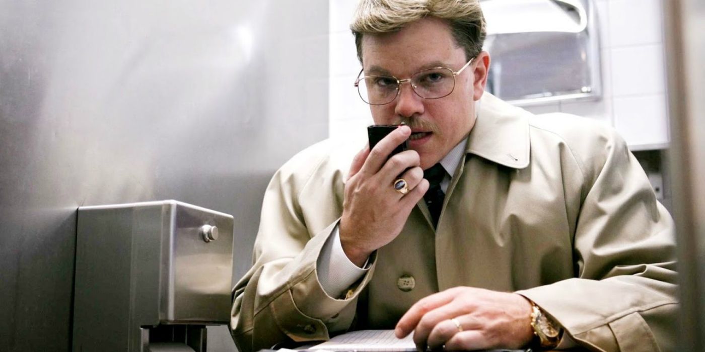 Matt Damon talking on the phone in a toilet stall in The Informant 2009