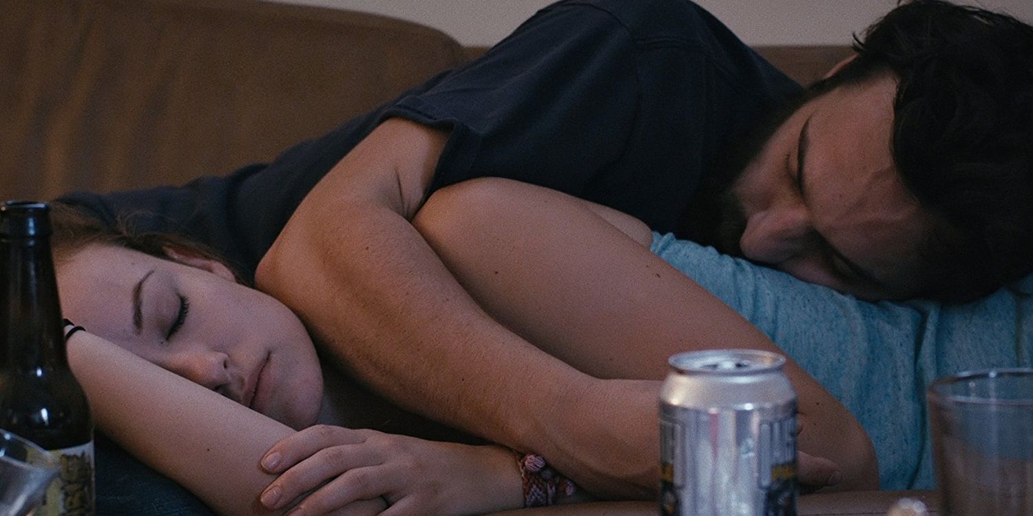 Olivia Wilde and Jake Johnson sleeping on a couch in Drinking Buddies 