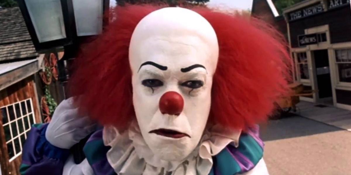 Tim Curry as Pennywise in the IT Miniseries