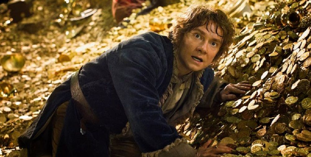 Bilbo evading Smaug in the gold pile in The Hobbit