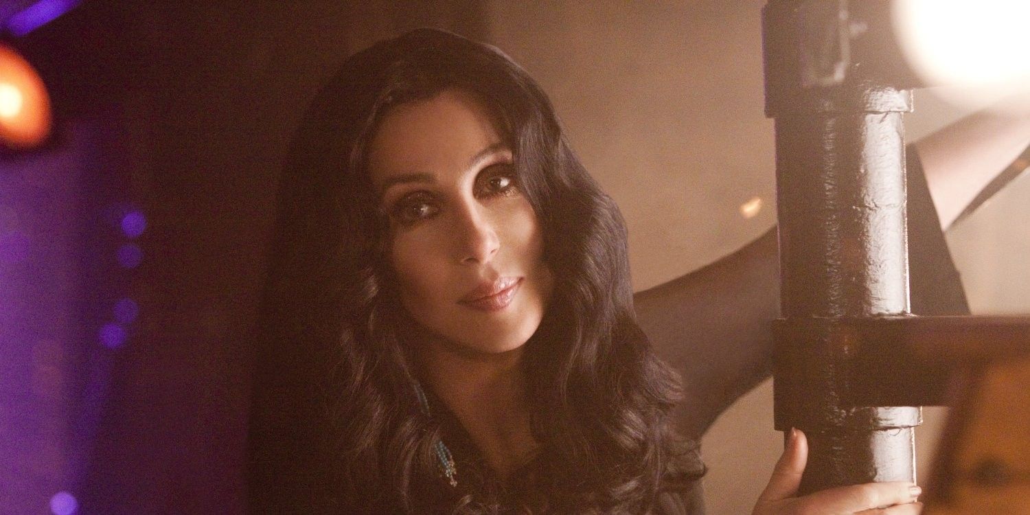 Cher in black as Tess in Burlesque
