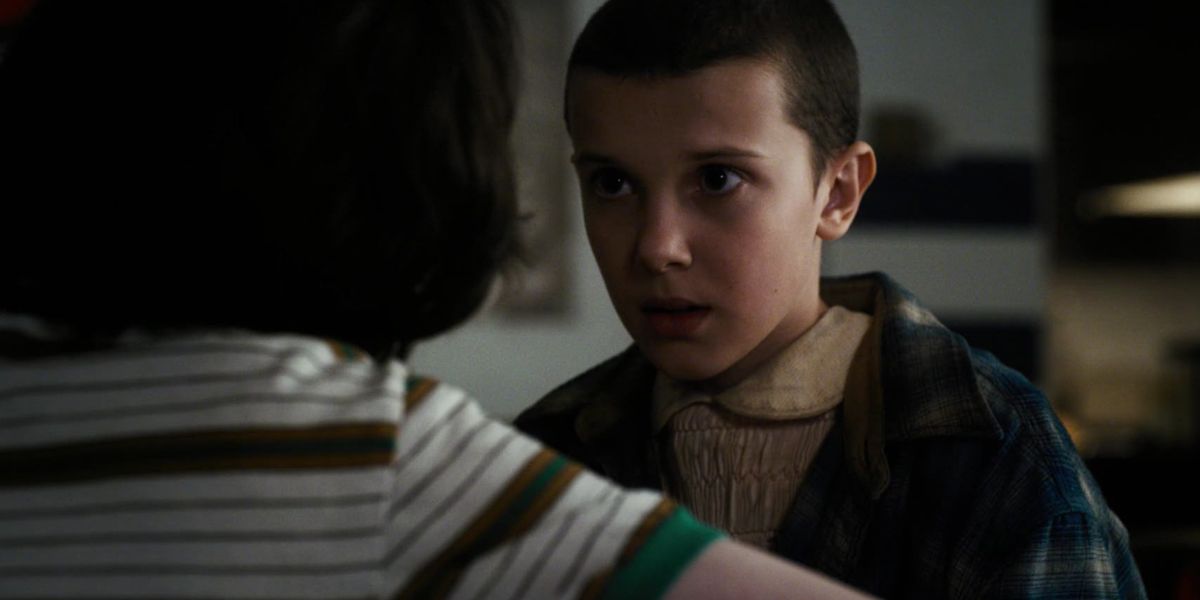 Eleven reacts after Mike kisses her in Stranger Things