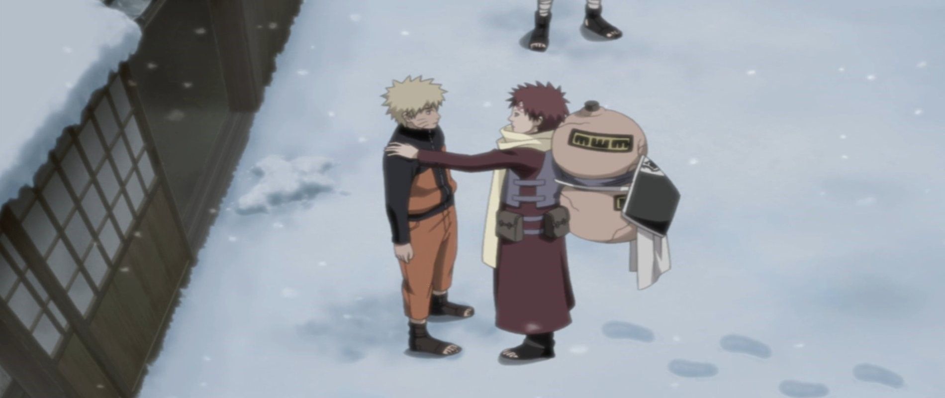 Gaara putting a hand on Naruto's shoulder in support in Naruto
