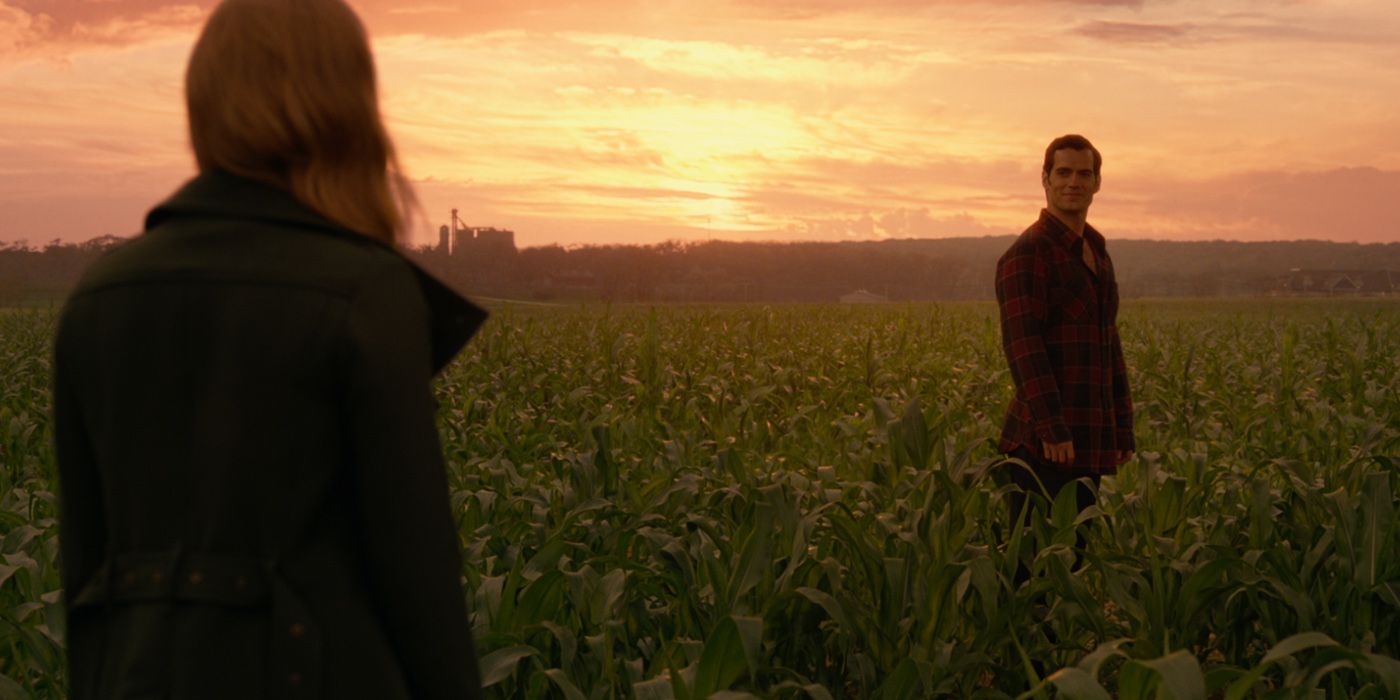 Lois looks at Clark in the field in Justice League