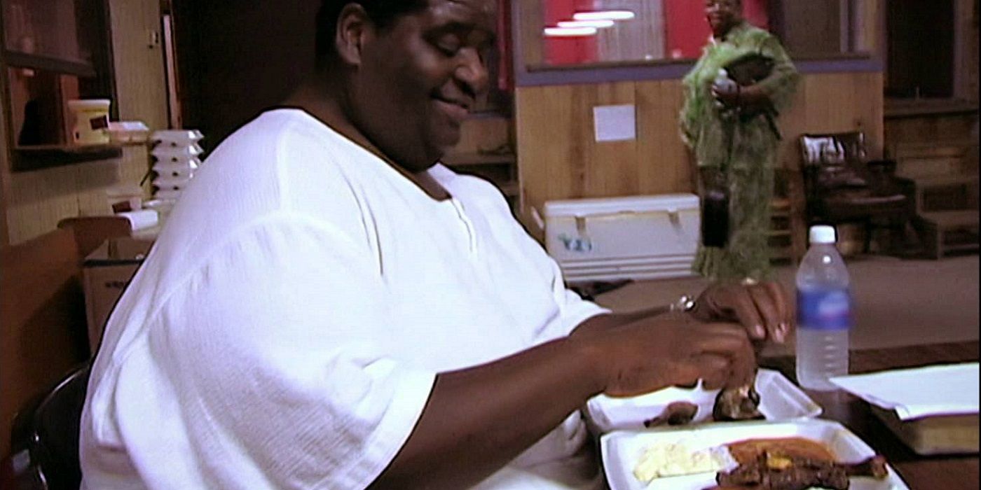 Henry Foots My 600lb Life eating take out in a white shirt