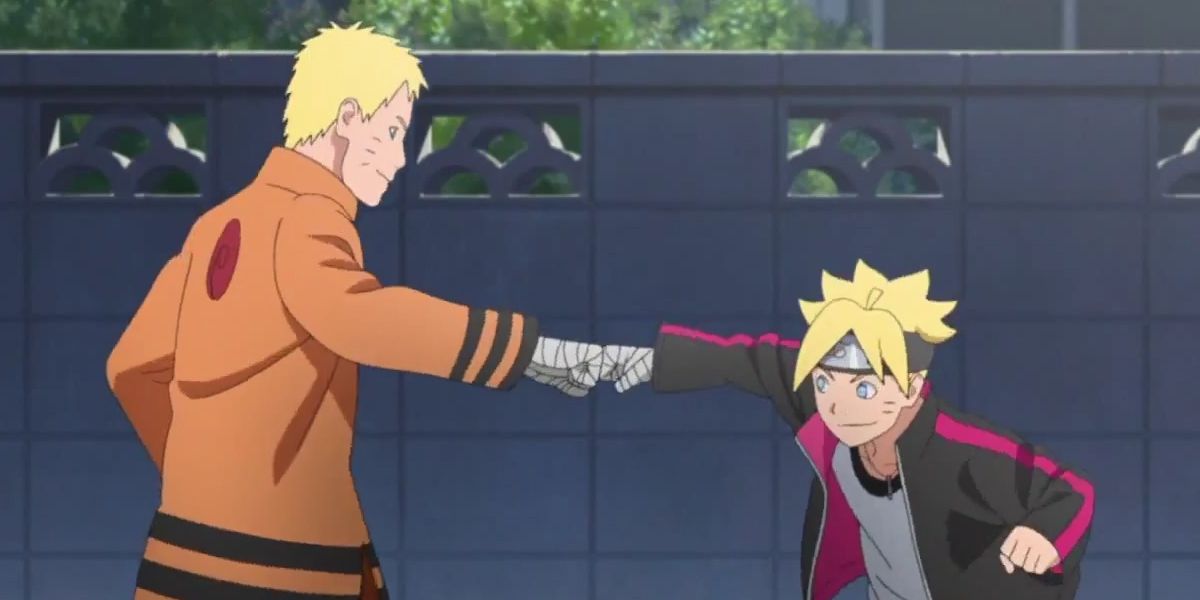 Naruto and Boruto Uzumaki share a fist bump