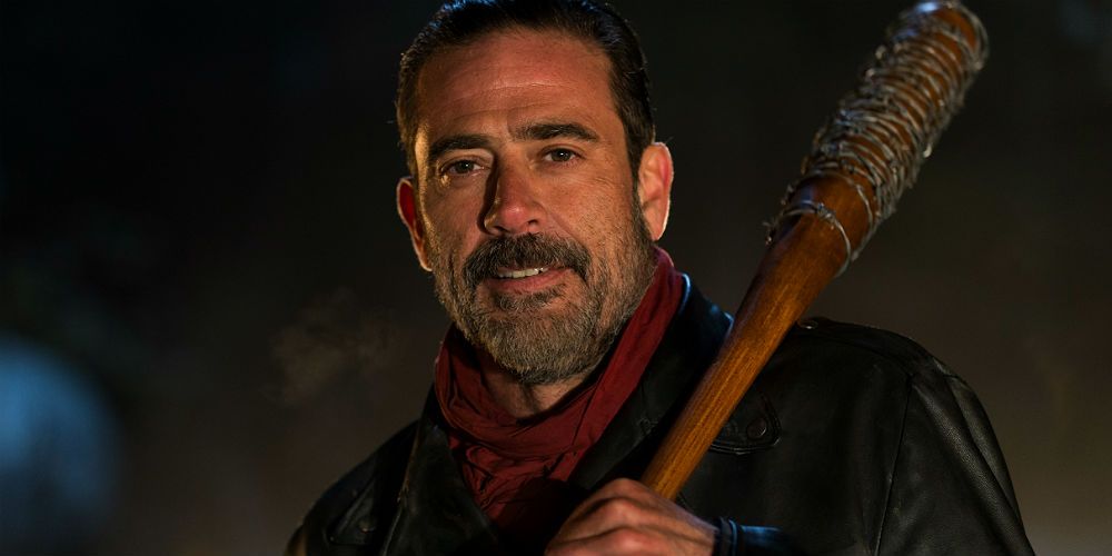 Negan from The Walking Dead smiling and hold his bat Lucille.