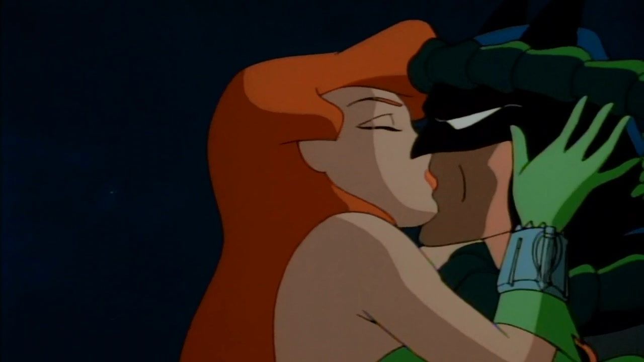 Poison Ivy kisses Batman
