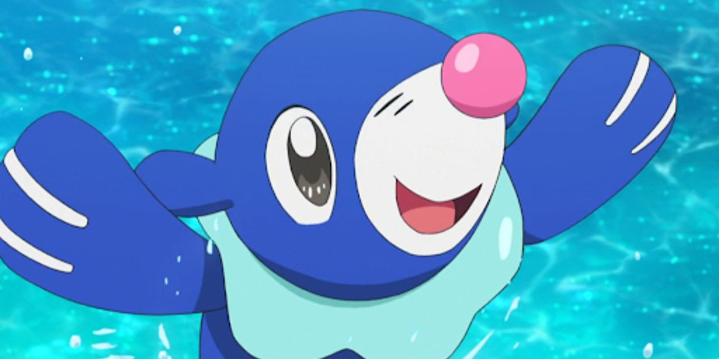 Popplio splashing in a pool in the Pokemon anime