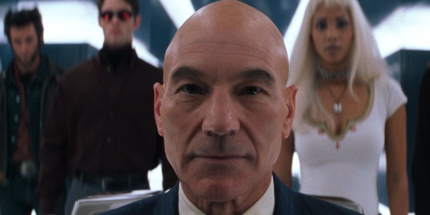 A close-up of Professor X walking toward Cerebro in front of Storm, Wolverine, and Cyclops in X-Men (2000)