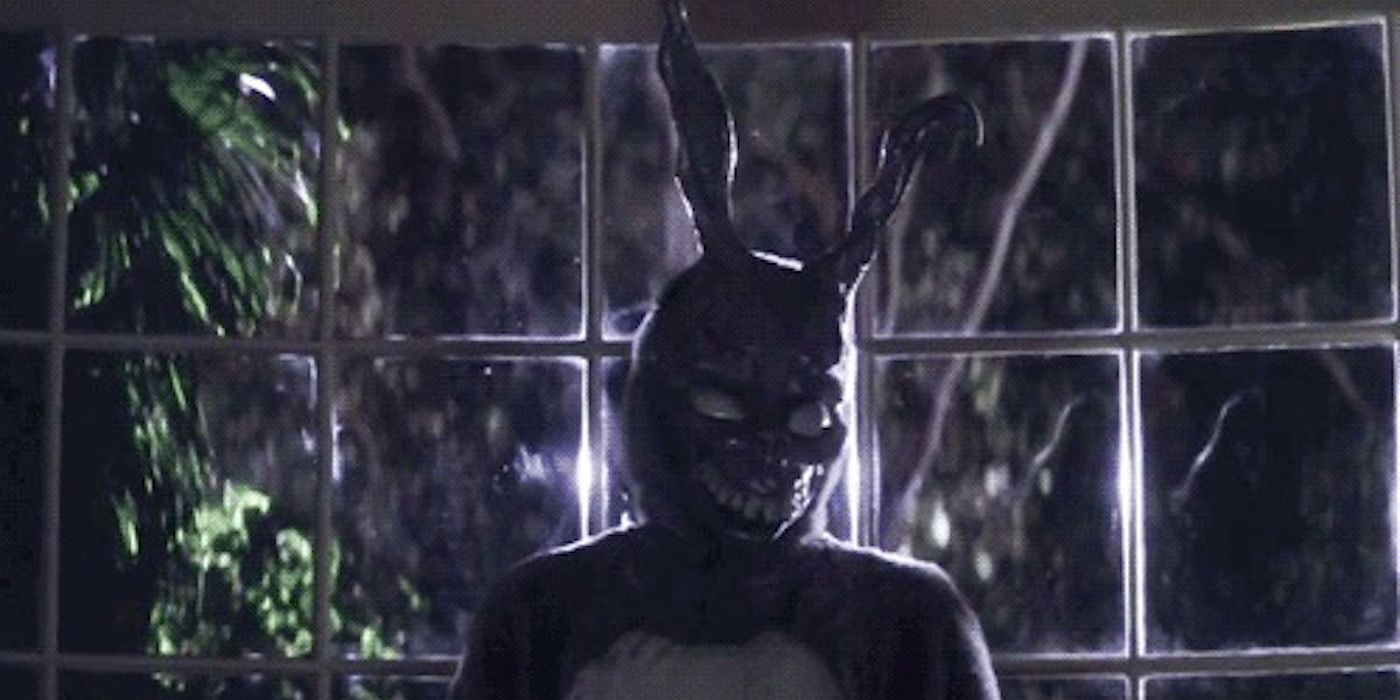 Frank standing by a window in Donnie Darko