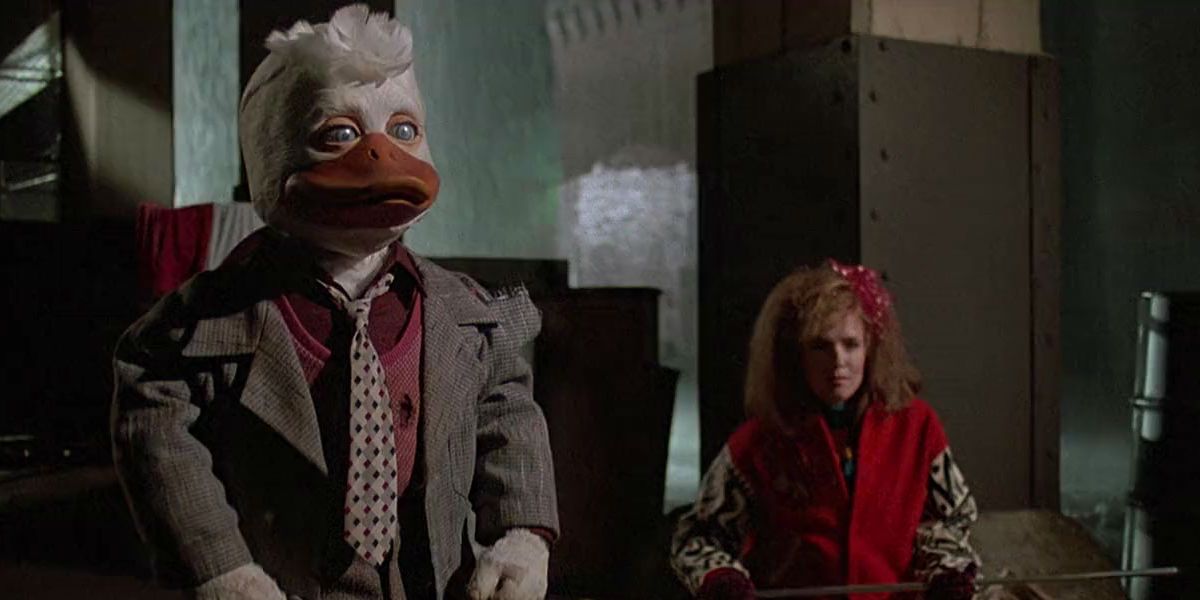 Howard the Duck and Lea Thompson in alley