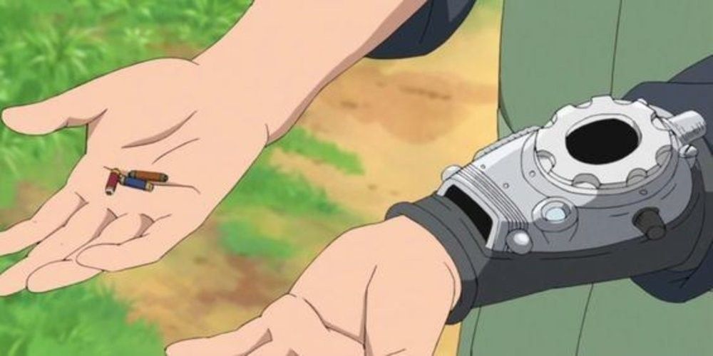 Boruto wears a Kote on his wrist and holds scrolls the size of pills in his palm in the anime