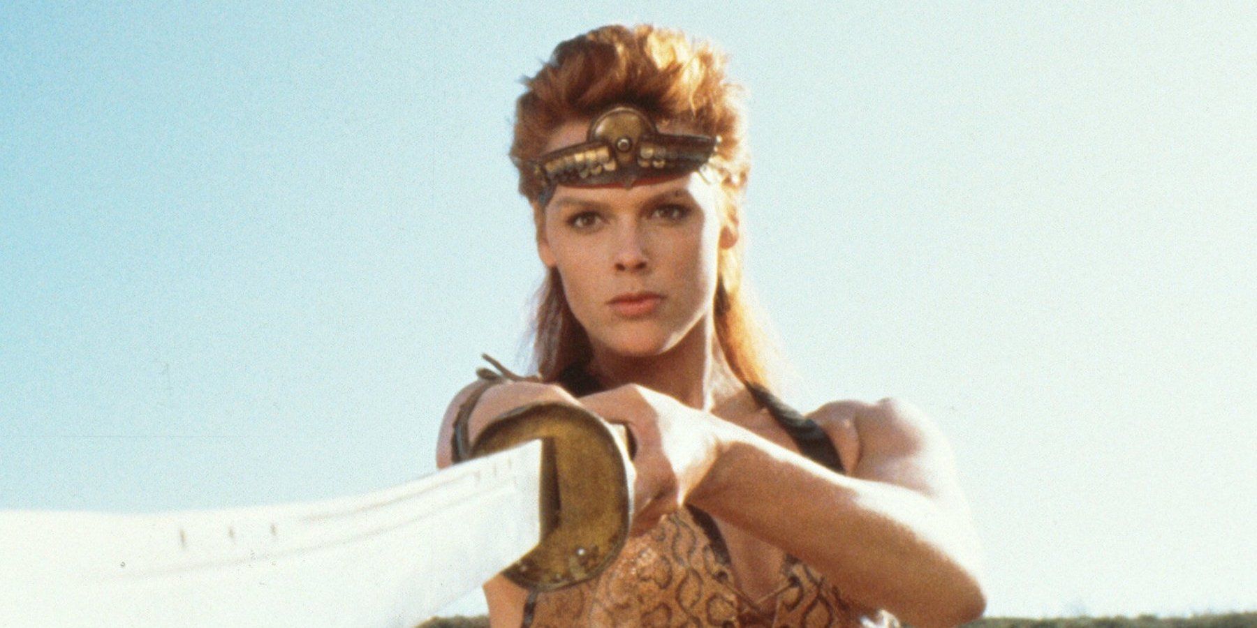 Brigitte Nielsen holding a sword in Red Sonja