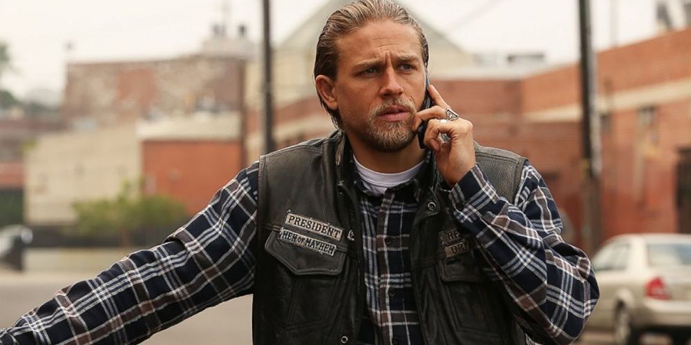 Charlie Hunnam as Jax Teller talking to someone on the phone  in Sons of Anarchy