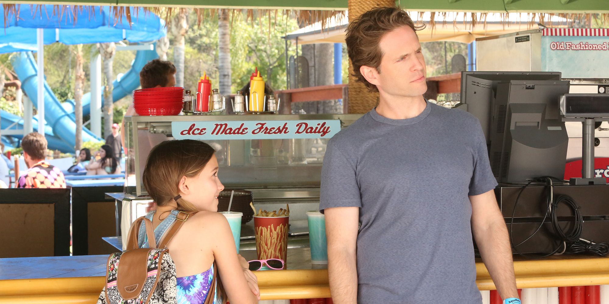 Glenn and his fake daughter at the water park in It's Always Sunny in Philadelphia.