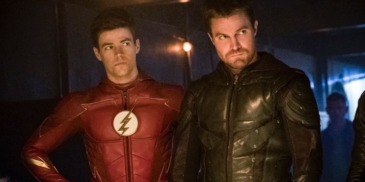 Grant Gustin and Stephen Amell in The Flash