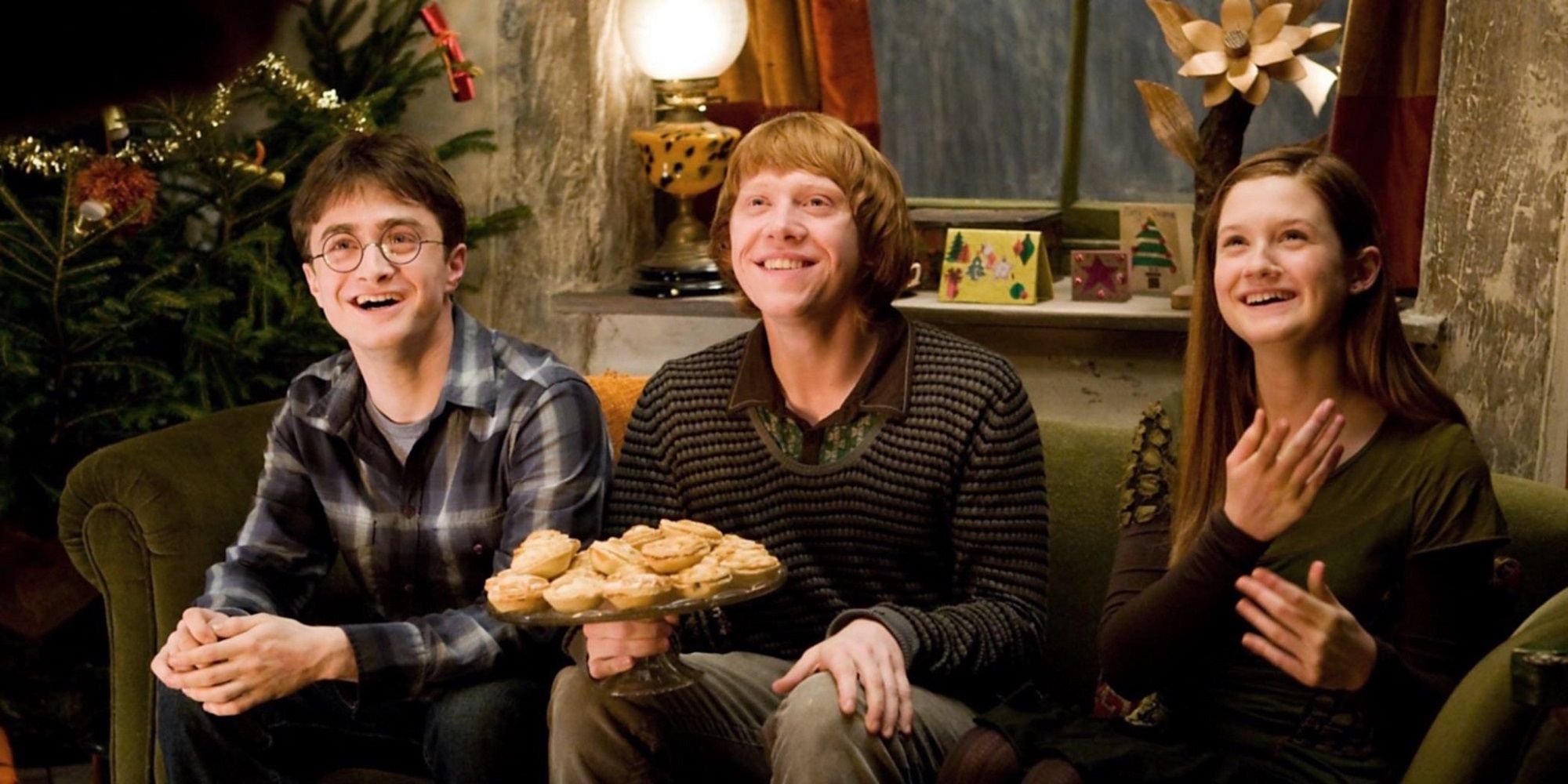 Harry, Ron, and Ginny sharing a plate of pumpkin pasties at Christmas